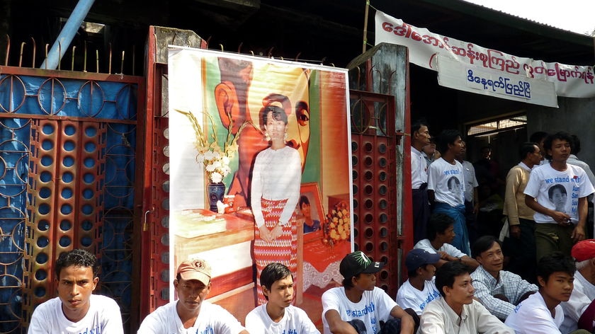 Supporters of Burma's detained opposition leader Aung San Suu Kyi