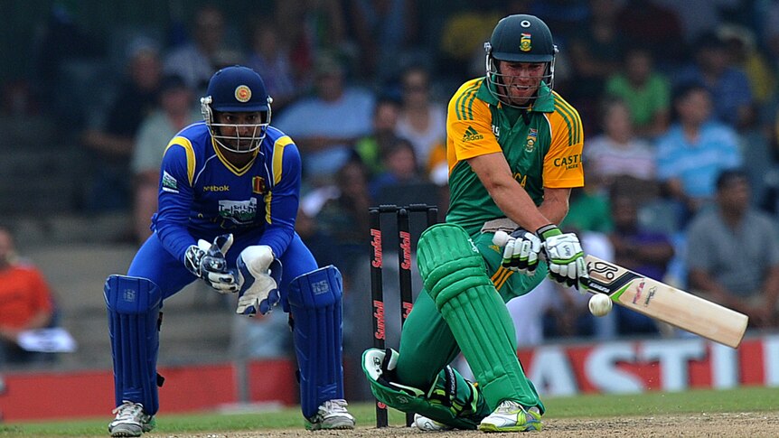 Successful chase ... AB de Villiers reverse sweeps on his way to 17 and the Proteas' five-wicket win.