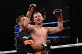 Jeff Horn celebrates with his couching corner