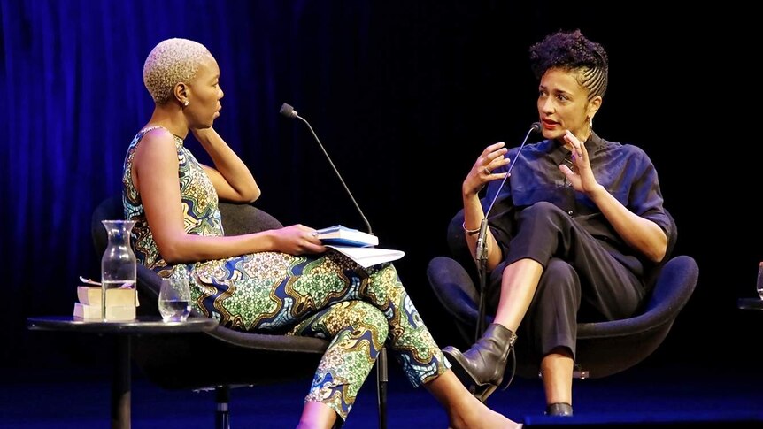 Writers Sisonke Msimang and Zadie Smith sitting on stage and in conversation at the Sydney Opera House