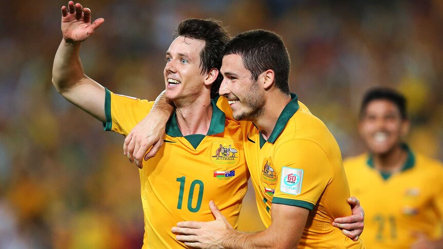 Robbie Kruse celebrates his goal for Socceroos against Oman