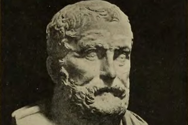 A bust of Thucydides against a black background.
