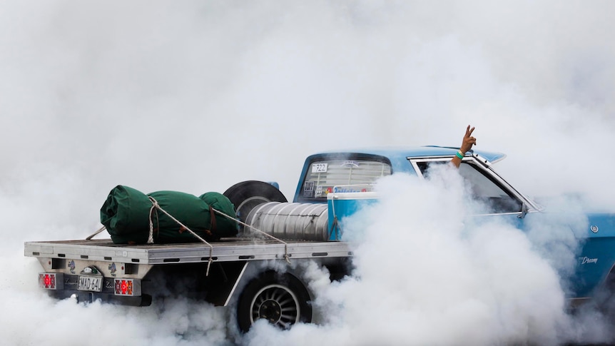 Burning rubber during the National Burnout Masters on the final day of the Summernats.