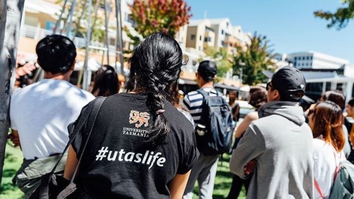 Unidentified uni students seen from behind.