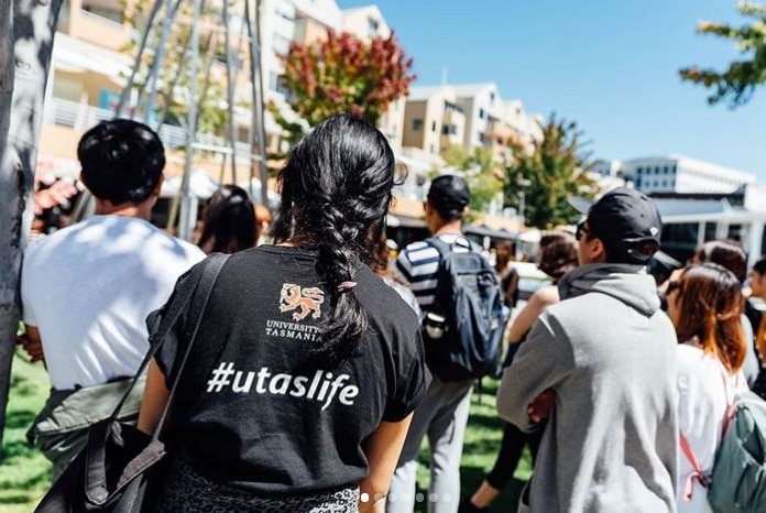 Unidentified uni students seen from behind.