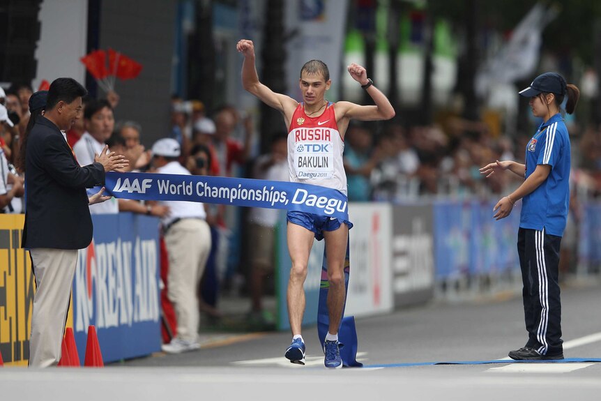 Russia's Sergey Bakulin crosses the line to win the men's 50km walk at the 2011 world titles.