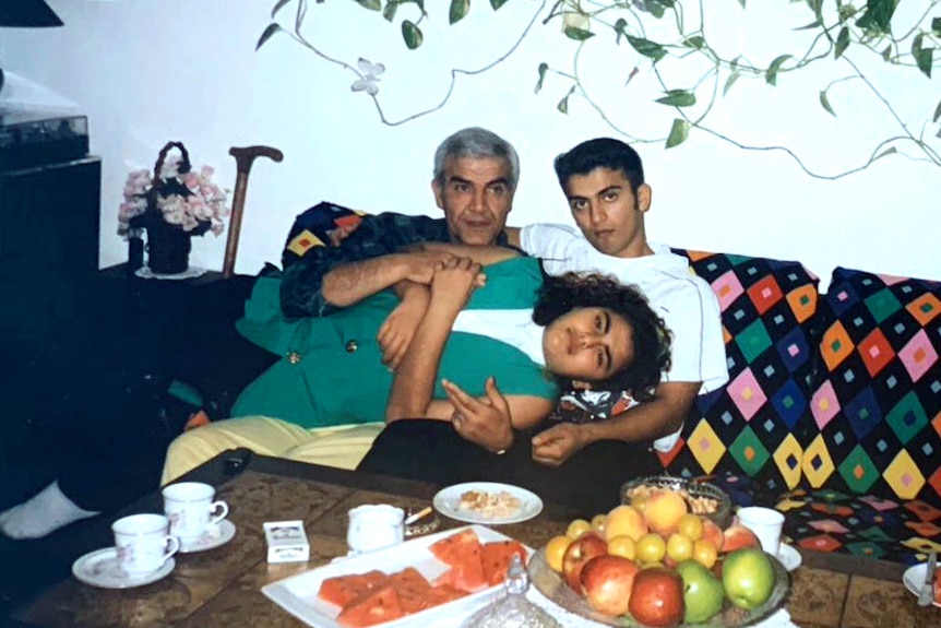 Ellie Jokar with father and brother