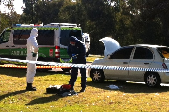 Police investigate man's body found in burnt car