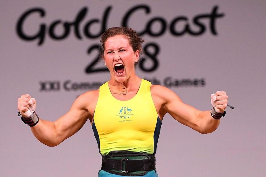Weightlifter Tia-Clair Toomey roars with approval after gold medal win