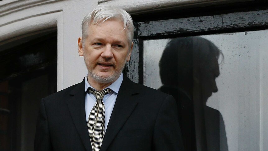 WikiLeaks founder Julian Assange speaks from the balcony of the Ecuadorean Embassy