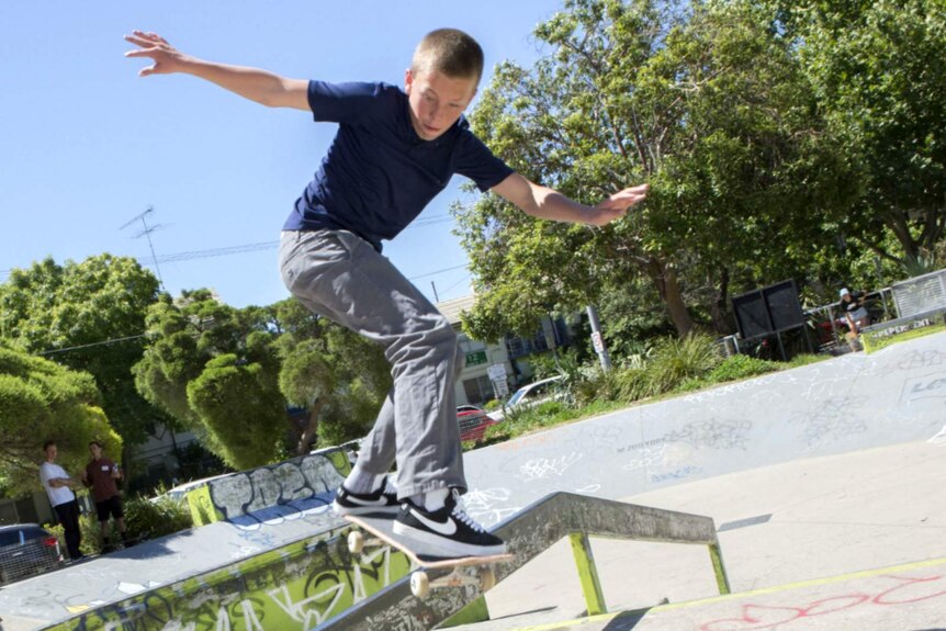 Young skateboarder Keegan Palmer, 14, does a trick.