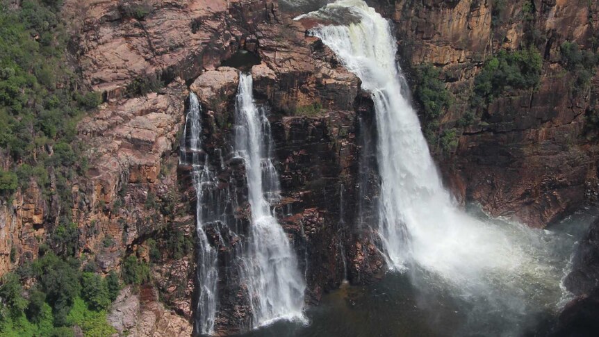 An aerial photograph of Kakadu's Twin Falls shows them in full swing during the wet season.