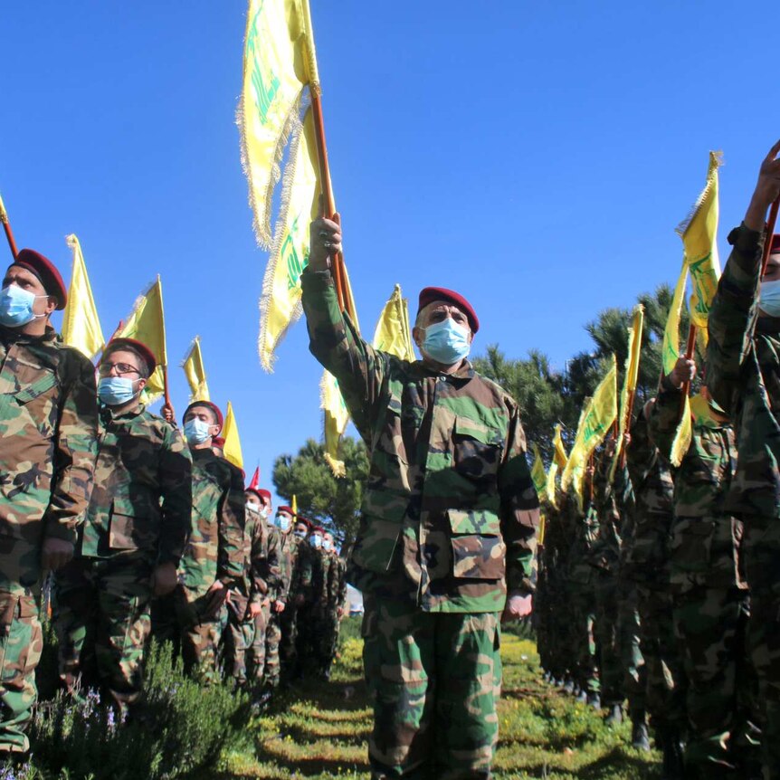 Members of Shiite movement Hezbollah hold a military parade in the town of Riyaq in Lebanon's Bekaa Valley.