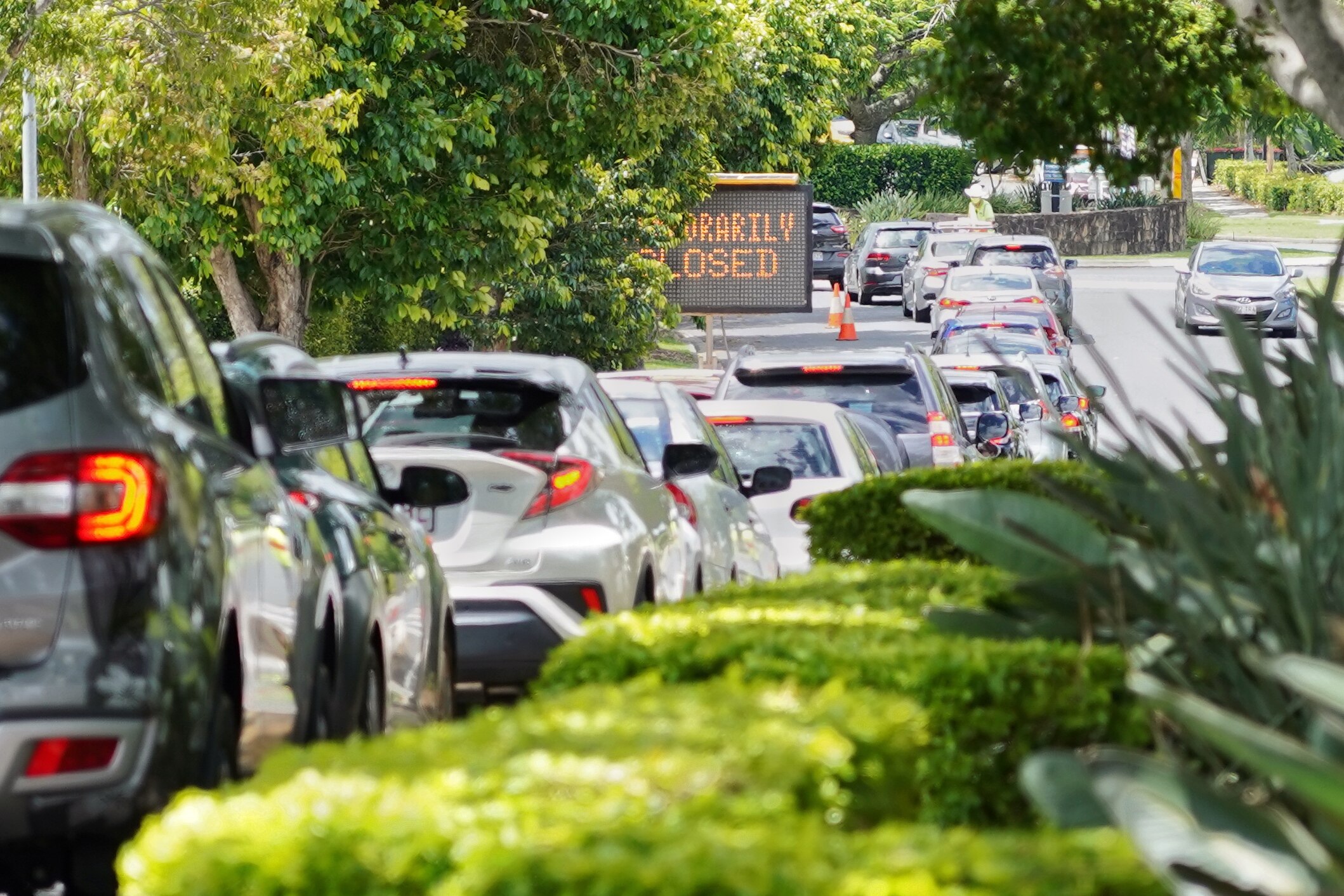'This isn't going to be over in two to three weeks': Mildly ill told to 'stay home' as COVID spreads through Queensland