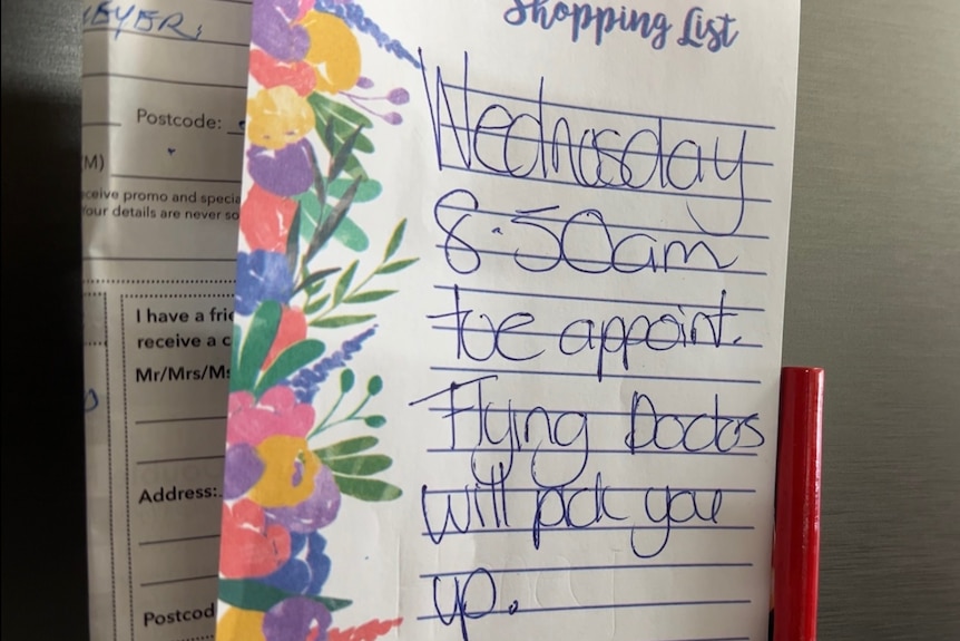 A fridge note saying "Wednesday 8.50pm toe appointment. Flying Docs will pick you up"