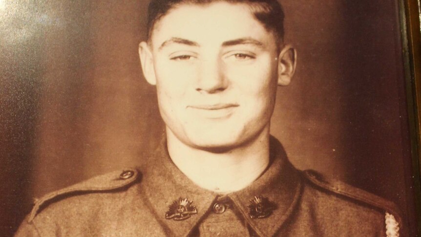 A portrait of World War II veteran Andy Bishop in uniform as a 16-year-old soldier.