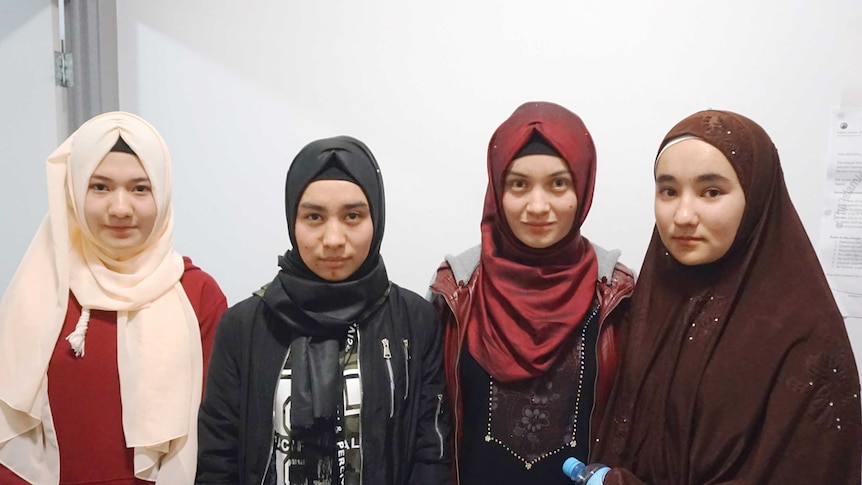 Four young women in a mosque.