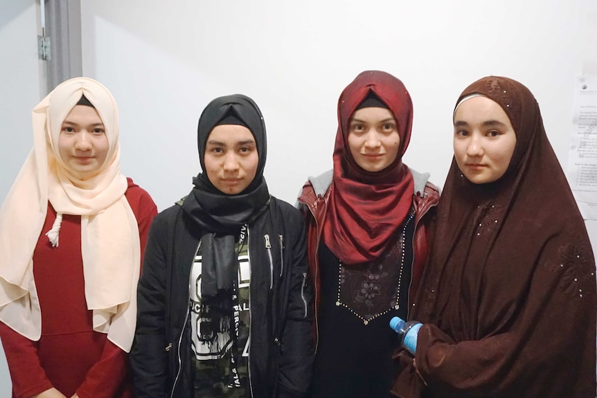 Four young women in a mosque.