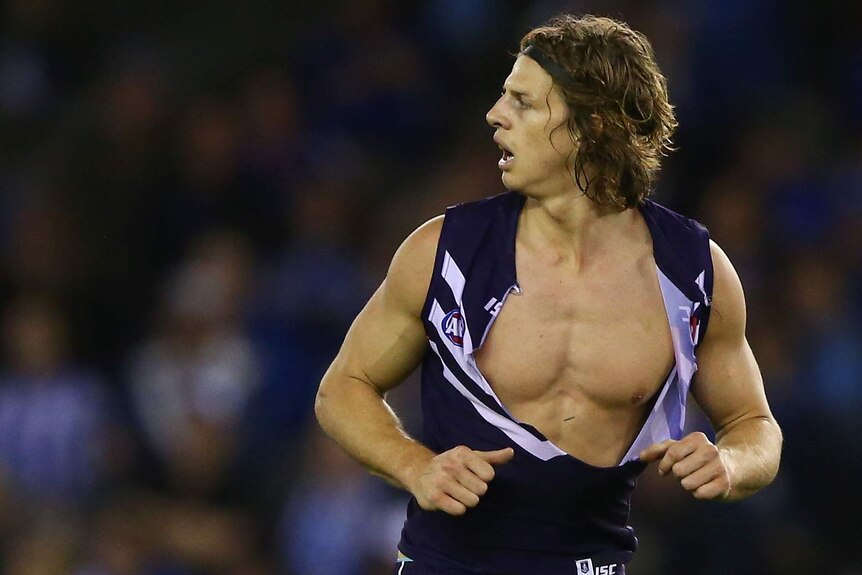 Nat Fyfe with his shirt ripped