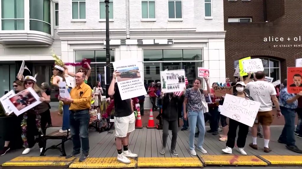 Protesters rally outside Tesla dealership in Washington, D.C. - ABC News