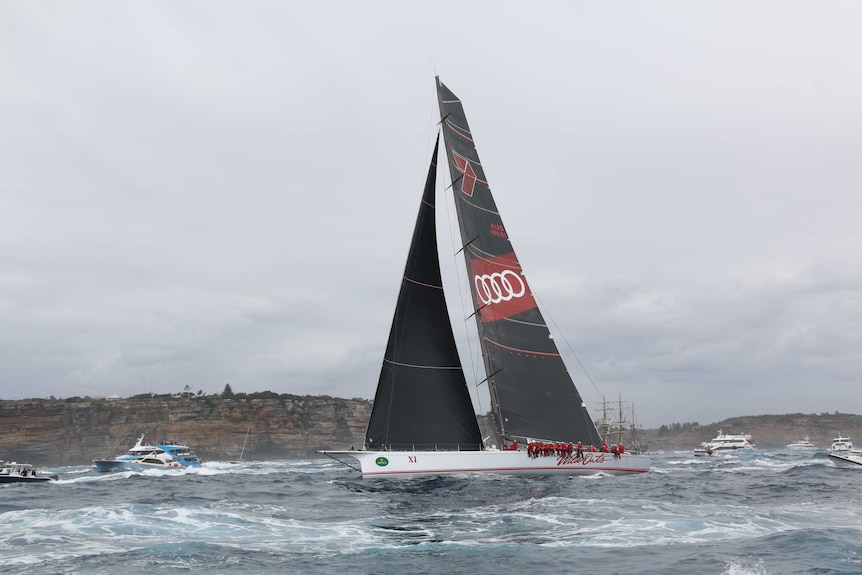 Wild Oats XI in action after the start of the 2017 Sydney-to-Hobart yacht race near Sydney Heads.