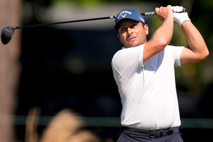 Francesco Molinari watches a tee shot during a US Open practice round.