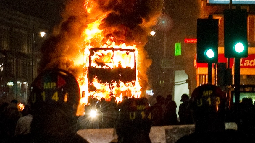 A double-decker bus burns during the Tottenham riots sparked by Mark Duggan's death