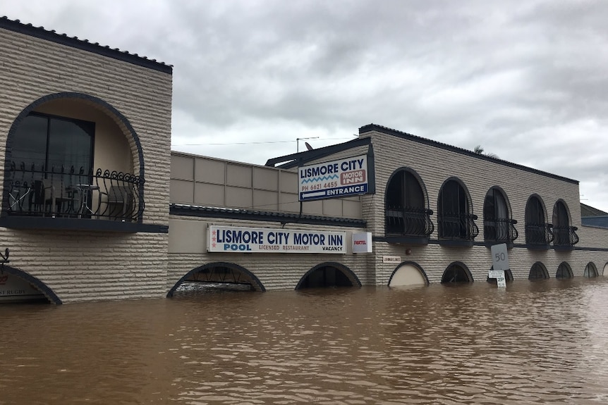 A building with flood water around it.