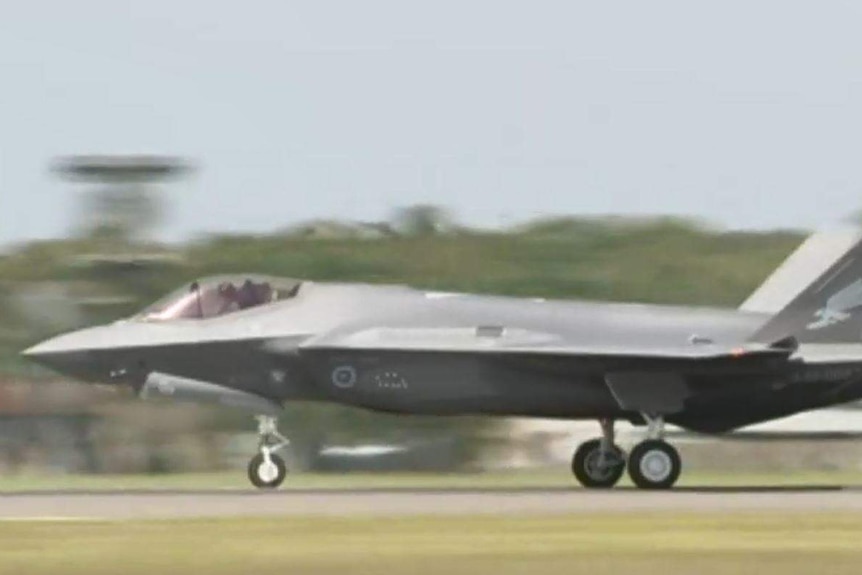 A F-35A Joint Strike Fighter touches down at its new home base at Williamtown, north of Newcastle in New South Wales.