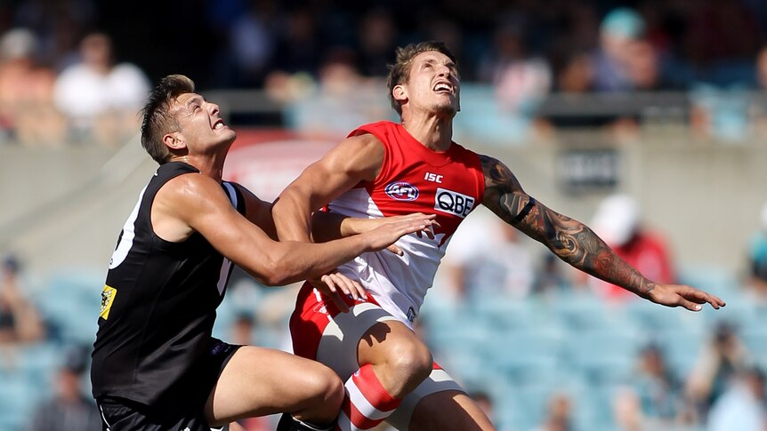 Contested ball ... Daniel Stewart (L) and Jesse White compete in the ruck