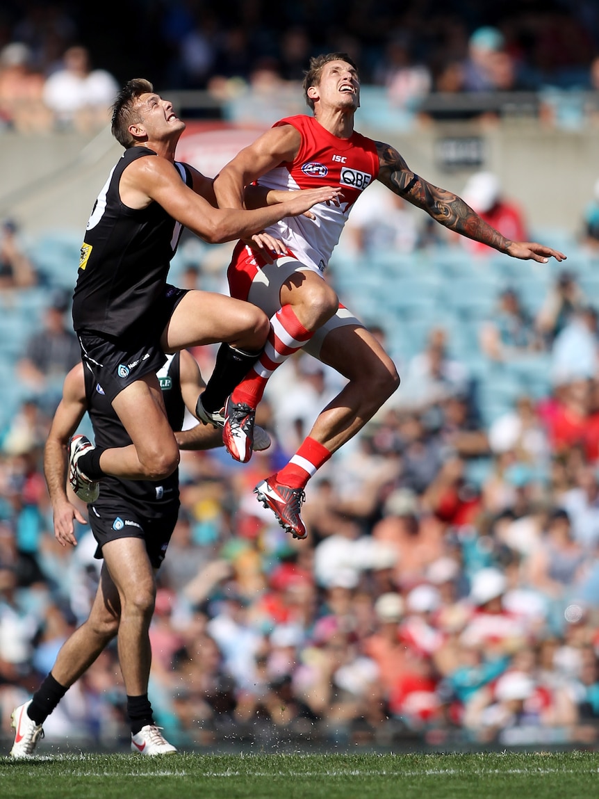 Contested ball ... Daniel Stewart (L) and Jesse White compete in the ruck