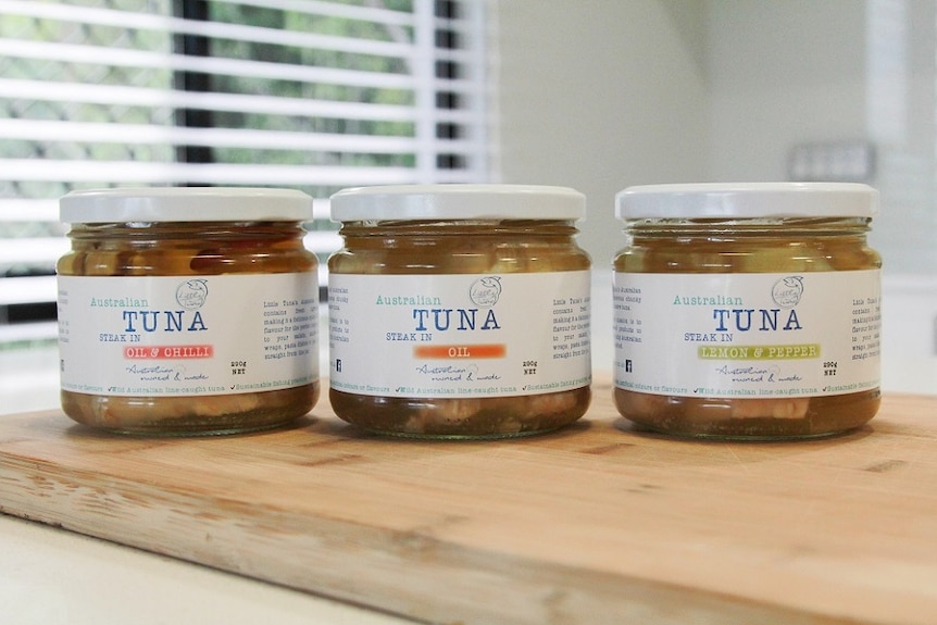 Three jars of different flavoured Little Tuna tuna in a row