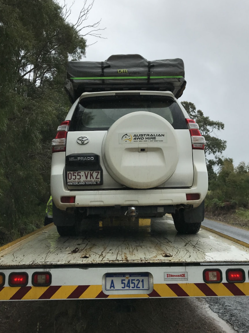Australian 4WD Hire vehicle on the back of a tow truck