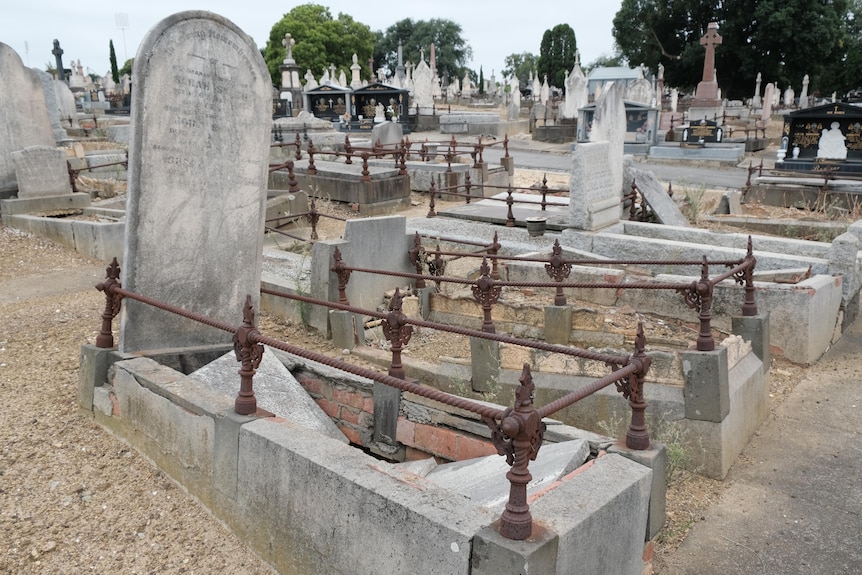 Damaged gravestones at a cemetery