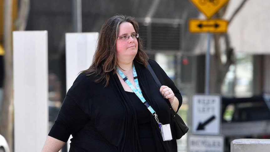 Sarah Mole, who is the personal assistant to Clive Palmer, arrives at the Federal Court in Brisbane.