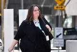 Sarah Mole, who is the personal assistant to Clive Palmer, arrives at the Federal Court in Brisbane.