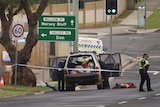 Tasmania Police attending a crime scene.