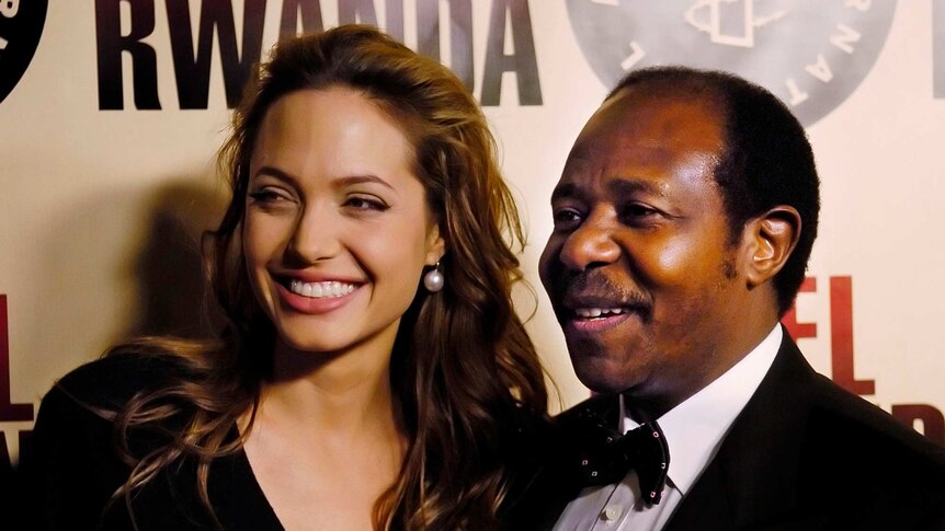 Paul Rusesabagina (right), the inspiration for the film Hotel Rwanda, poses with actress Angelina Jolie