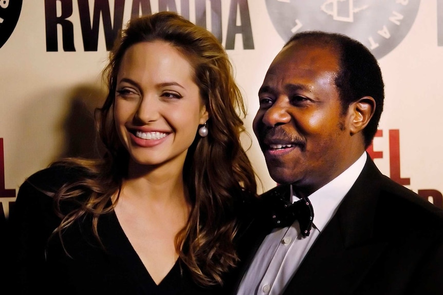 Paul Rusesabagina (right), the inspiration for the film Hotel Rwanda, poses with actress Angelina Jolie