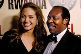 Paul Rusesabagina (right), the inspiration for the film Hotel Rwanda, poses with actress Angelina Jolie