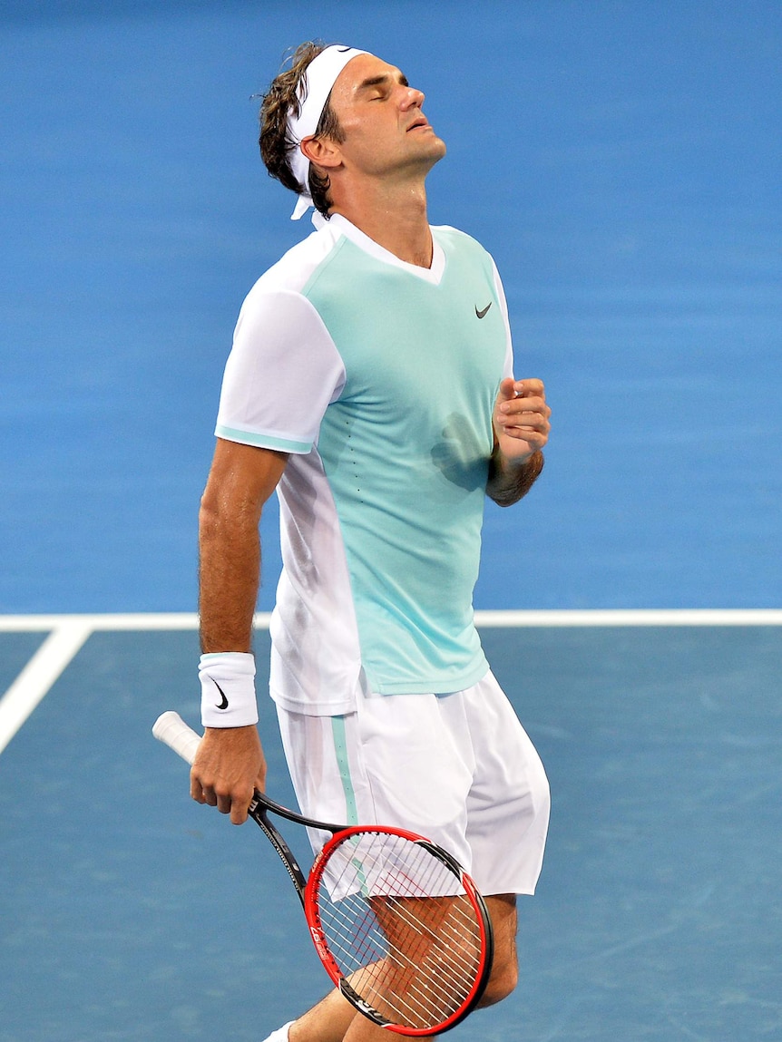 Roger Federer grimmaces during Brisbane International