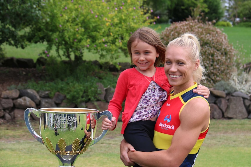 Adelaide Crows captain Erin Phillips holding her niece Leni Burgeon