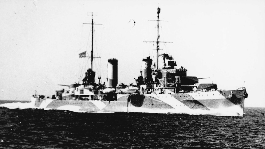 A black and white photo of the ship HMAS Perth during World War Two.