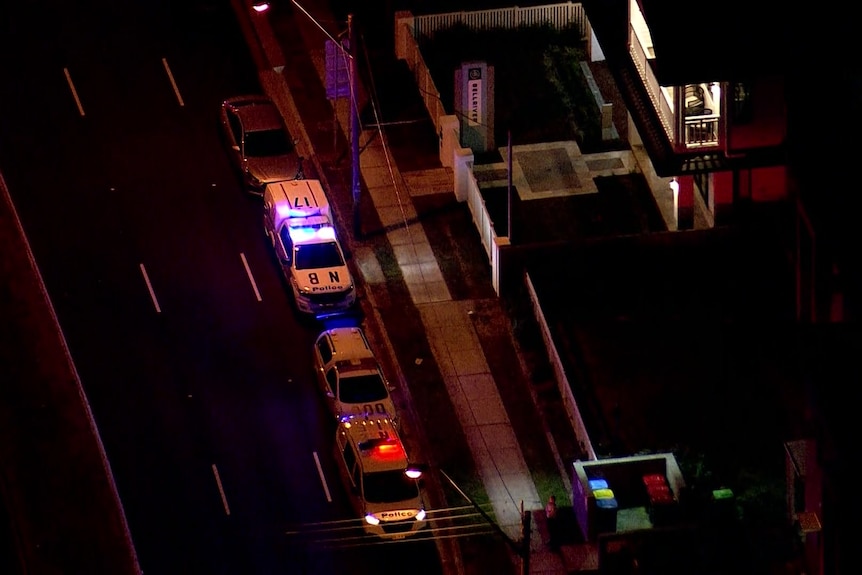 aerial vision of police cars in the dark