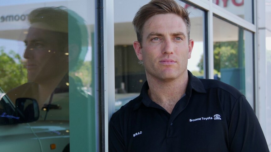 Former West Coast Eagles defender Brad Sheppard standing outside of the Broome Toyota showroom. 