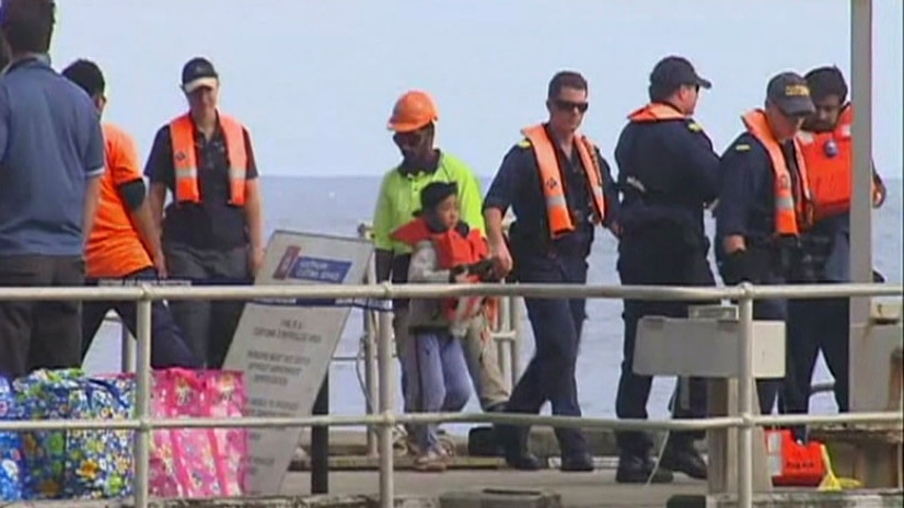 Asylum seekers bound for Malaysia arrive on Christmas Island. (ABC TV)
