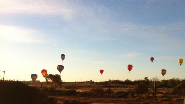 Hot air balloons float through the sky in north-west Victoria
