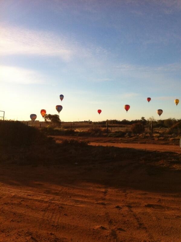 Hot air balloons float through the sky in north-west Victoria