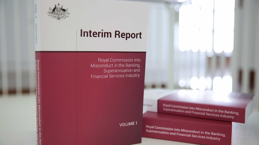 Banking royal commission interim reports on a table.