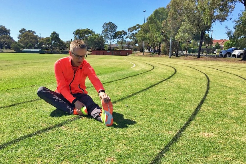 Jared Tallent stetches at training in Adelaide